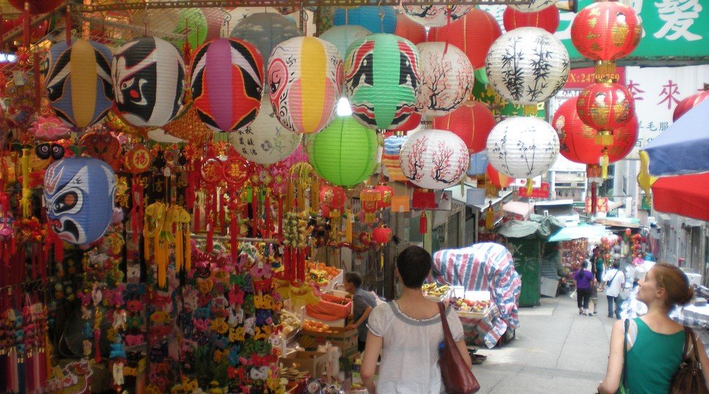 women go shopping in asia